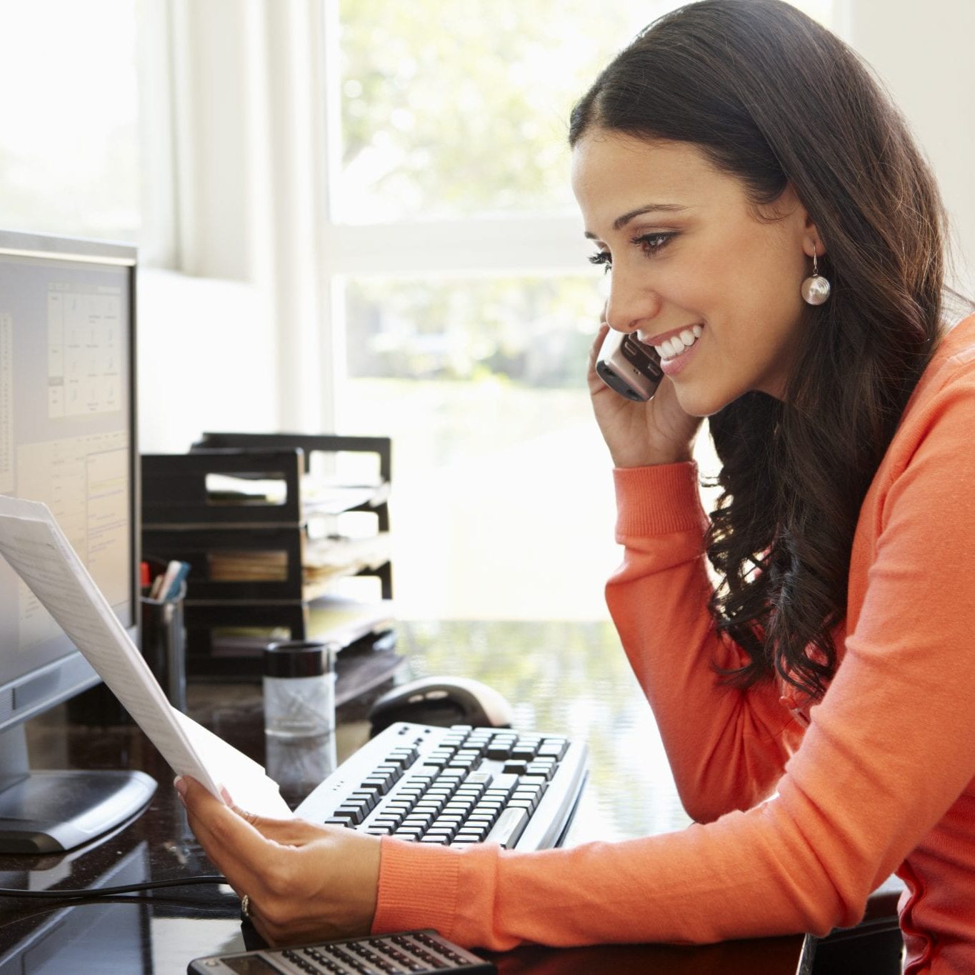 bigstock-Hispanic-woman-working-in-home-91334555